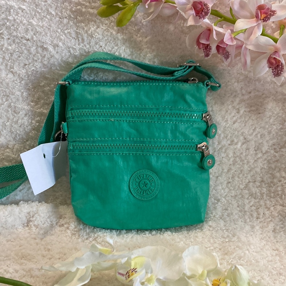 Kipling three pocket crossbody purse